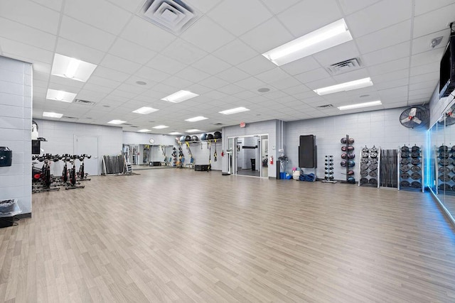 403 Veterans Blvd Unit 203 G6, Branson, MO 65616 - gym featuring a paneled ceiling, visible vents, and wood finished floors