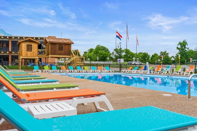 403 Veterans Blvd Unit 203 G6, Branson, MO 65616 - pool with a patio and fence