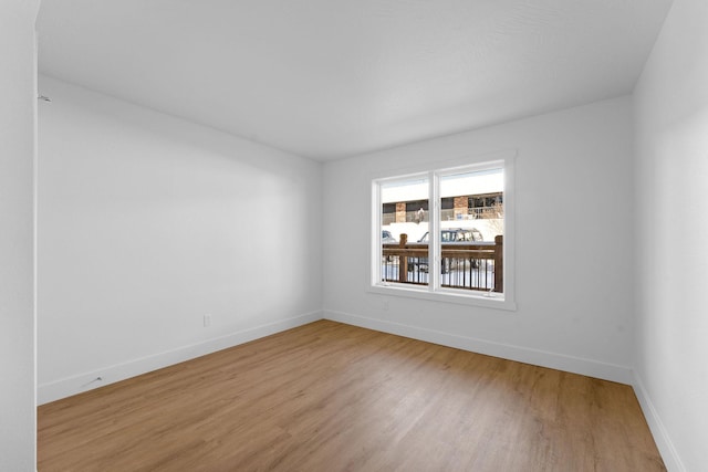 403 Veterans Blvd Unit 203 G6, Branson, MO 65616 - spare room featuring light wood finished floors and baseboards
