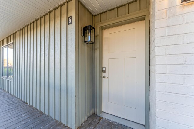 403 Veterans Blvd Unit 203 G6, Branson, MO 65616 - doorway to property featuring board and batten siding