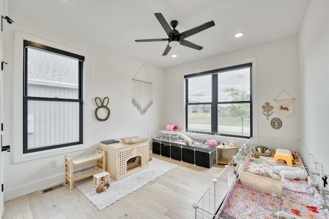 bedroom featuring a ceiling fan, recessed lighting, light wood finished floors, and visible vents
