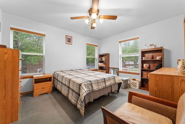 carpeted bedroom featuring a ceiling fan