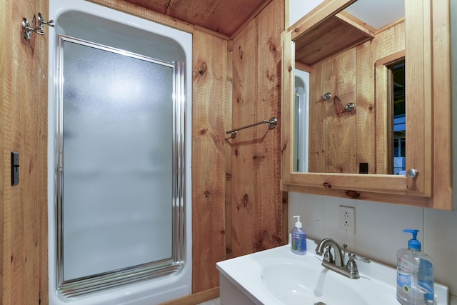full bath featuring a shower stall and vanity