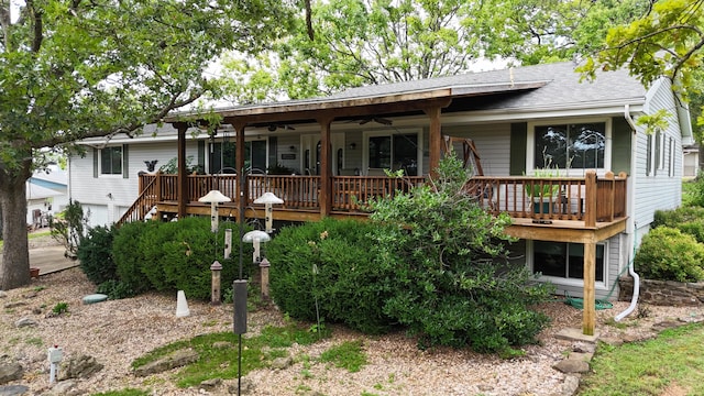 26742 Royal Point Dr, Shell Knob, MO 65747 - rear view of house featuring ceiling fan, a shingled roof, a wooden deck, and an attached garage