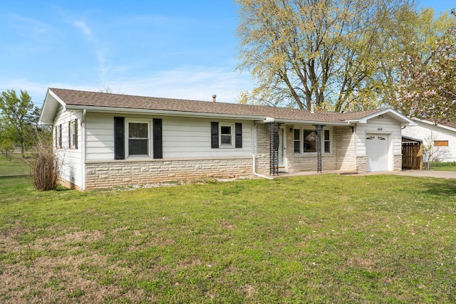 single story home with a front lawn, stone siding, a garage, and concrete driveway