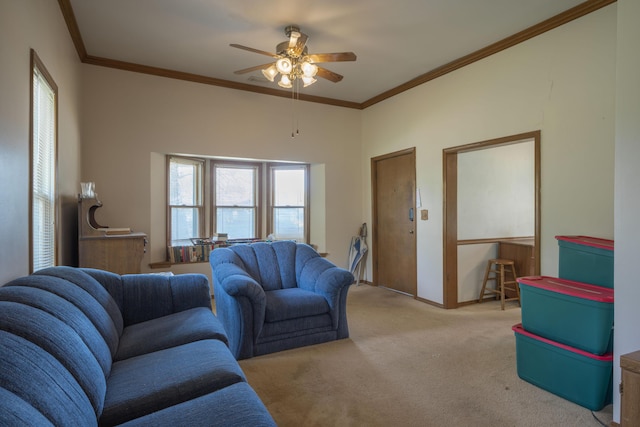 living area with baseboards, carpet flooring, crown molding, and ceiling fan