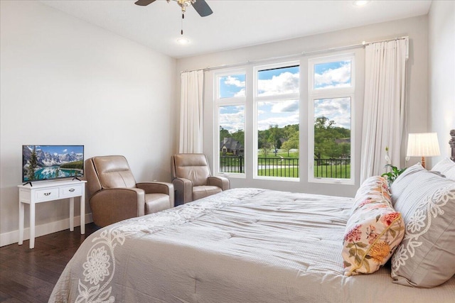 bedroom with baseboards, dark wood finished floors, recessed lighting, and a ceiling fan