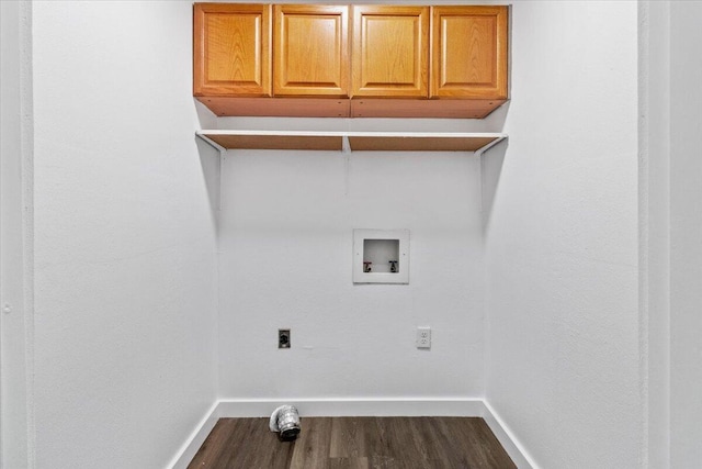 laundry room featuring cabinet space, electric dryer hookup, baseboards, and hookup for a washing machine