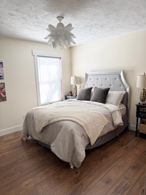 1118 E Ritter St, Republic, MO 65738 - bedroom with baseboards, ceiling fan, a textured ceiling, and wood finished floors
