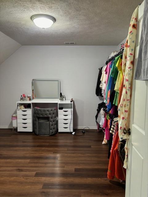 1118 E Ritter St, Republic, MO 65738 - spacious closet with lofted ceiling, visible vents, and wood finished floors