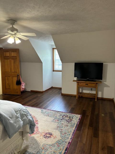 1118 E Ritter St, Republic, MO 65738 - bedroom featuring baseboards, a textured ceiling, and wood finished floors