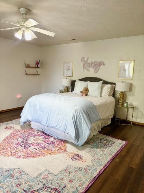 1118 E Ritter St, Republic, MO 65738 - bedroom featuring a ceiling fan, baseboards, and wood finished floors