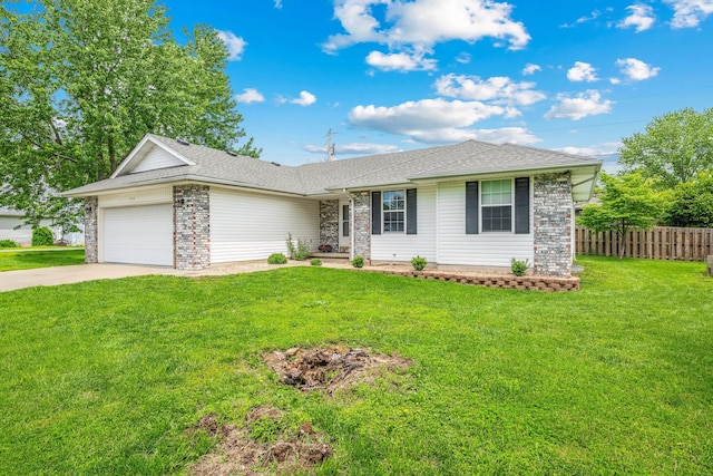 ranch-style home with an attached garage, concrete driveway, fence, and a front yard