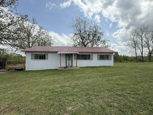 1398 County Road 670, Birch Tree, MO 65438 - view of front of property featuring a front yard, a deck, metal roof, and concrete block siding