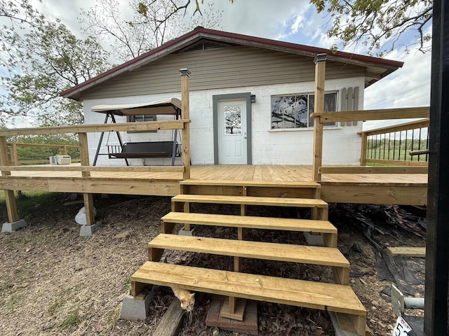 1398 County Road 670, Birch Tree, MO 65438 - exterior space with a wooden deck and concrete block siding