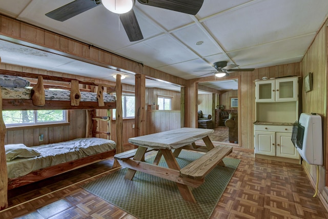 sunroom featuring heating unit