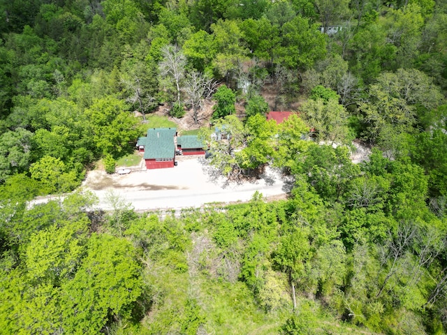 drone / aerial view with a view of trees