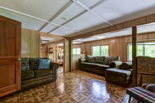 living area with wood walls