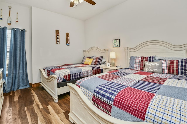 bedroom featuring a ceiling fan and wood finished floors