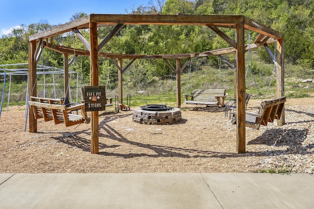 exterior space featuring a fire pit