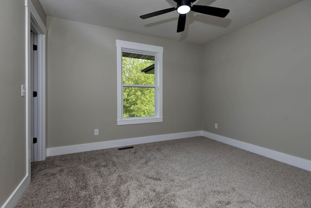 385 Plumtree Dr, Ozark, MO 65721 - unfurnished room featuring visible vents, baseboards, a ceiling fan, and carpet floors