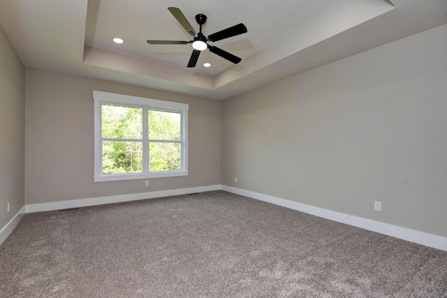 385 Plumtree Dr, Ozark, MO 65721 - carpeted spare room with a ceiling fan, visible vents, baseboards, a raised ceiling, and recessed lighting