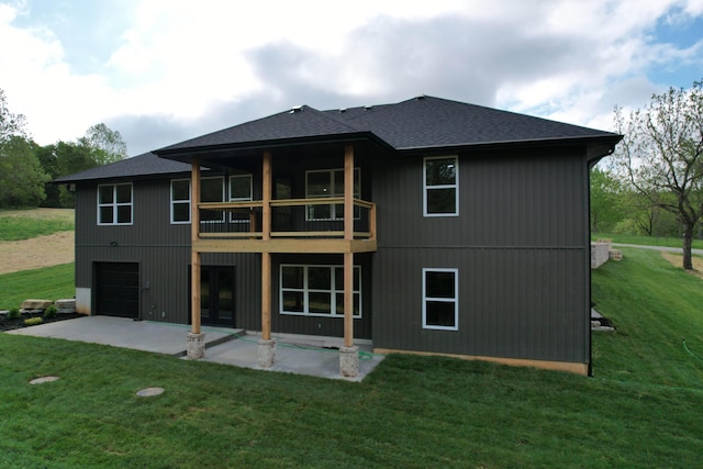 385 Plumtree Dr, Ozark, MO 65721 - rear view of property with a yard, a balcony, a patio, an attached garage, and roof with shingles