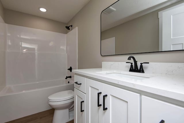 385 Plumtree Dr, Ozark, MO 65721 - bathroom featuring toilet, shower / bathtub combination, wood finished floors, vanity, and visible vents