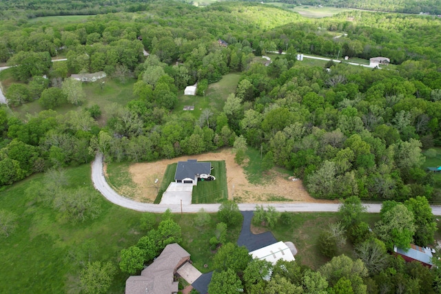 385 Plumtree Dr, Ozark, MO 65721 - drone / aerial view with a forest view