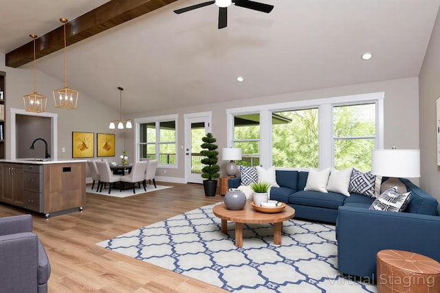 385 Plumtree Dr, Ozark, MO 65721 - living area with recessed lighting, light wood-style floors, lofted ceiling with beams, and ceiling fan with notable chandelier