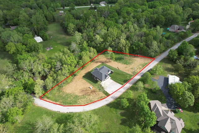 385 Plumtree Dr, Ozark, MO 65721 - drone / aerial view featuring a forest view