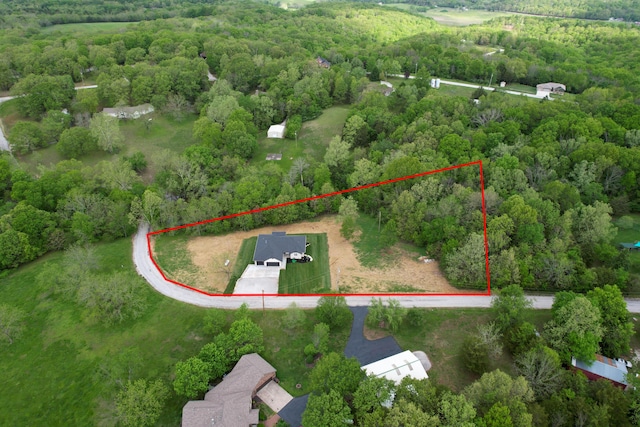 385 Plumtree Dr, Ozark, MO 65721 - bird's eye view with a wooded view