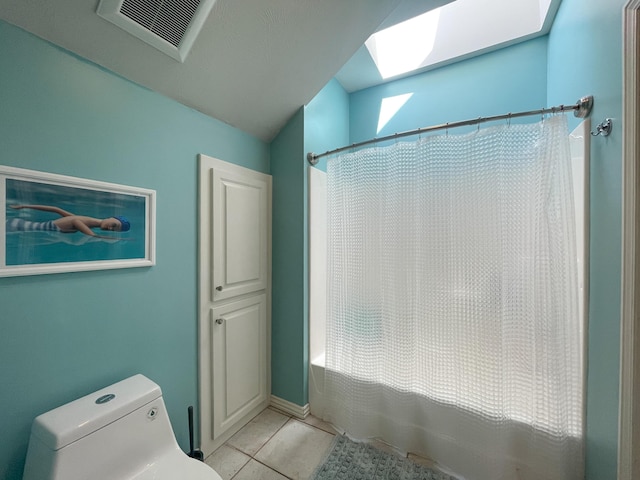 full bath featuring toilet, shower / bath combination with curtain, visible vents, tile patterned floors, and a skylight