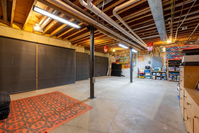 unfinished below grade area featuring electric panel
