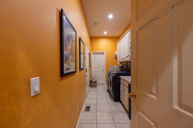 laundry room with cabinet space, visible vents, recessed lighting, separate washer and dryer, and light tile patterned floors