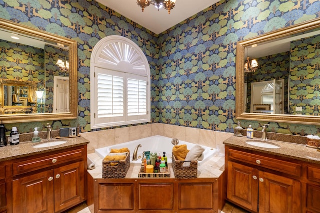 full bathroom featuring a garden tub, wallpapered walls, and a sink