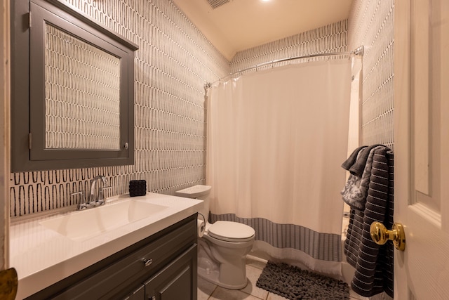 full bathroom with a shower with curtain, toilet, tile patterned floors, vanity, and tasteful backsplash