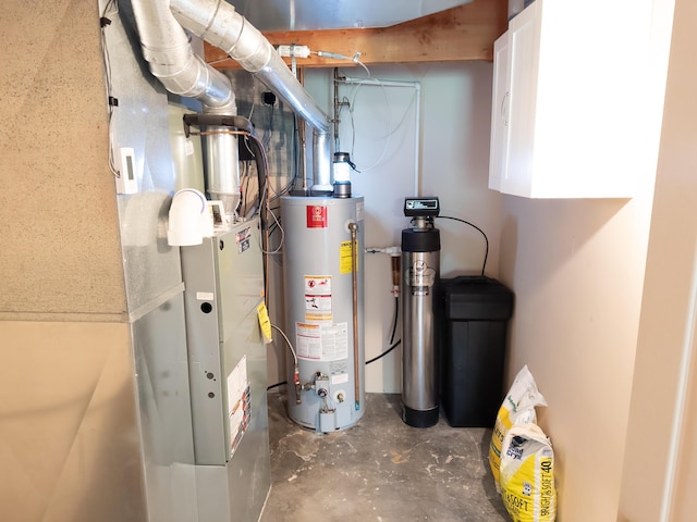 utility room featuring gas water heater