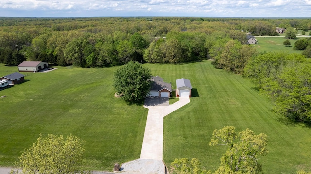 birds eye view of property with a rural view and a view of trees