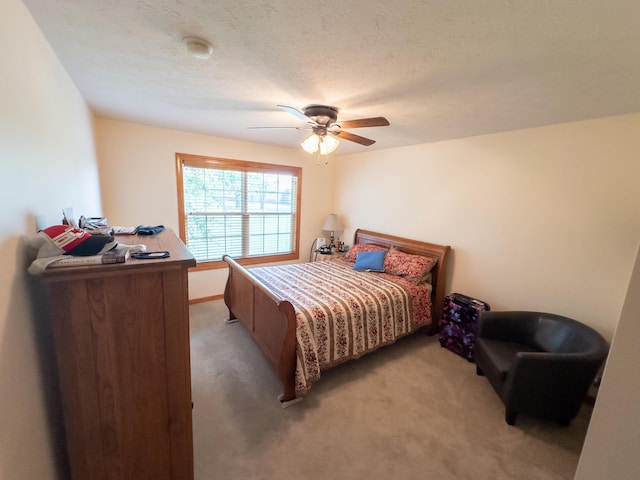 bedroom with light colored carpet and ceiling fan