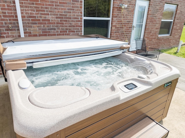 view of patio featuring a hot tub