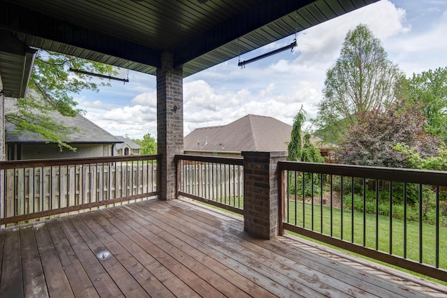 deck featuring a lawn