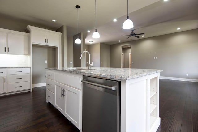 kitchen featuring baseboards, dark wood finished floors, a sink, and dishwasher