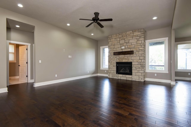 unfurnished living room with dark wood-style floors, baseboards, a ceiling fan, and recessed lighting