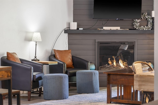112 Overlook Dr Unit 2, Branson, MO 65616 - interior space featuring wood finished floors and a warm lit fireplace
