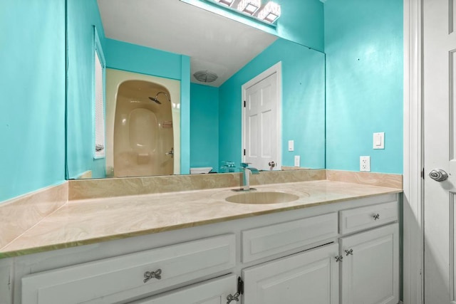 full bathroom with a shower and vanity