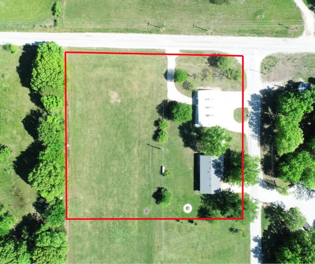 birds eye view of property featuring a rural view