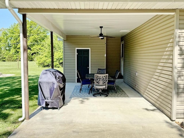 view of patio / terrace with a grill, outdoor dining area, and ceiling fan