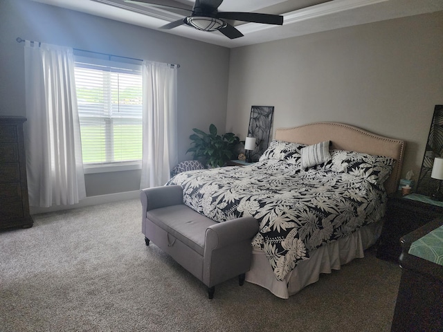 bedroom with ceiling fan, carpet flooring, and baseboards