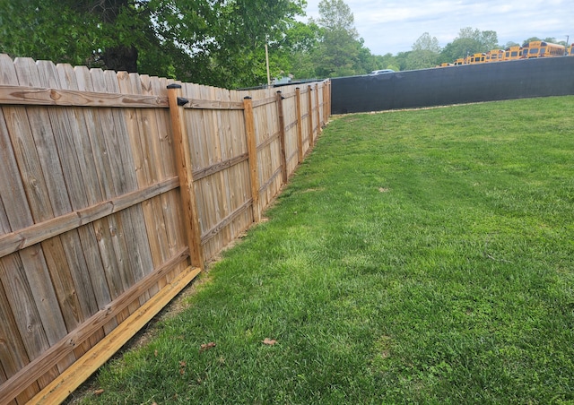 view of yard featuring a fenced backyard